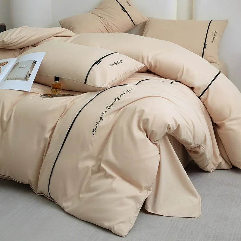 2025 new solid color embroidered ribbon double-spell skin-friendly washed cotton 4-piece set bed sheet and fitted sheet style