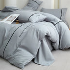 2025 new solid color embroidered ribbon double-spell skin-friendly washed cotton 4-piece set bed sheet and fitted sheet style