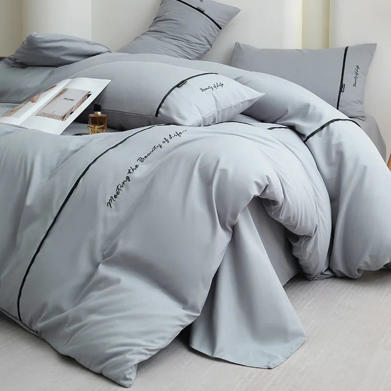 2025 new solid color embroidered ribbon double-spell skin-friendly washed cotton 4-piece set bed sheet and fitted sheet style